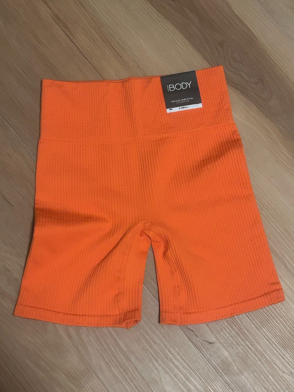 orange nwt cotton on workout shorts